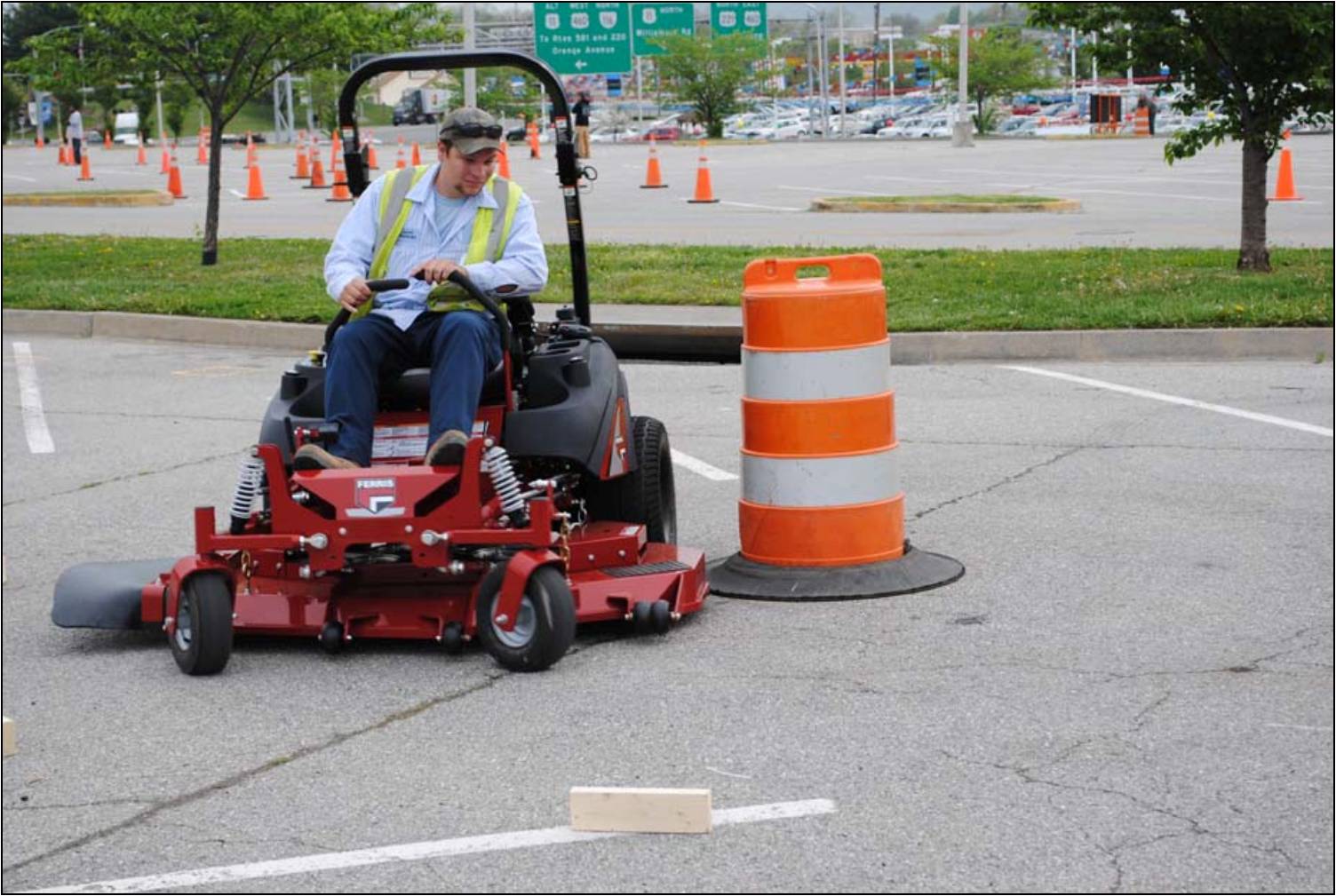 Town of Vinton employee Jared races through the obstacle course in the Zero Turn Mower event.